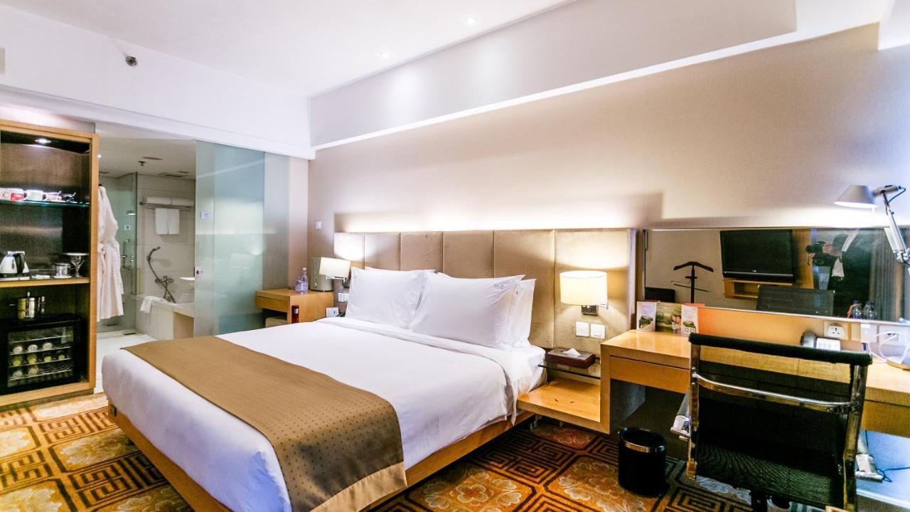 Holiday Inn Binhai Tianjin Habitación foto